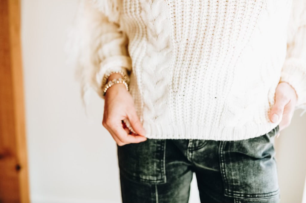 CARTER FRINGE TURTLENECK SWEATER