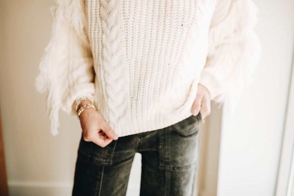 CARTER FRINGE TURTLENECK SWEATER