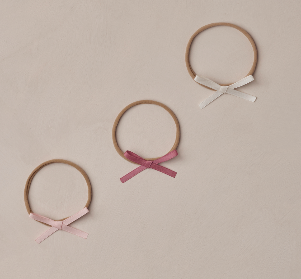 BABY BOW HEADBANDS | IVORY, ROSE, RASPBERRY