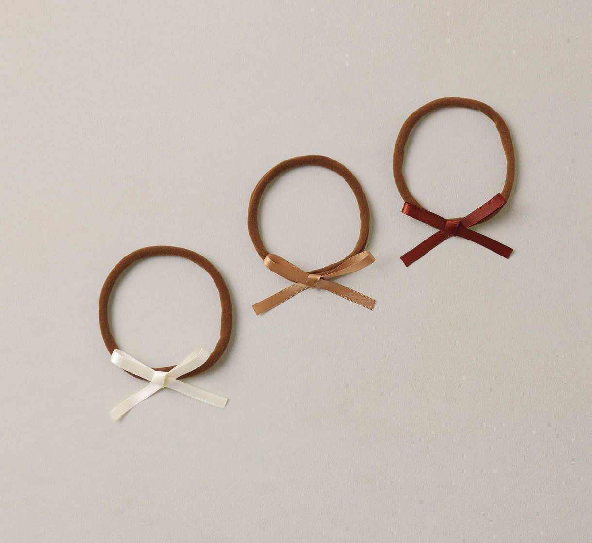 BABY BOW HEADBANDS SPICE, IVORY, GOLD